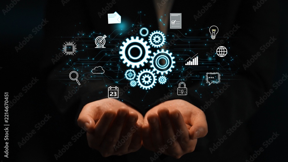 Fototapeta premium Hands Holding Gear Icons Symbolizing Technology and Innovation in a Digital World with Data, Charts, and Social Media Elements for Business Context. Entropy.