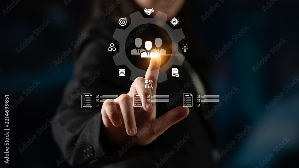 Fototapeta premium Business Professional Interacting with Digital Icons Representing Collaboration, Data, Technology, and Management Concepts in a Modern Office Environment. Glyphic.
