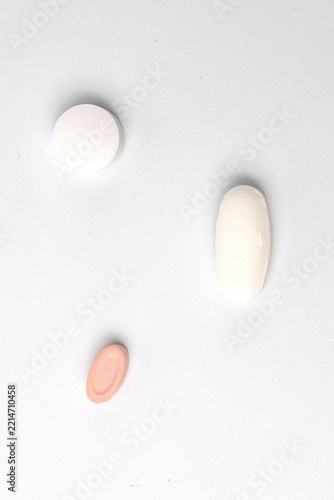 Medical Pills And Tablets On White Background