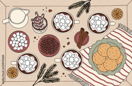 Hot cocoa bar top view with mugs, marshmallows and toppings
