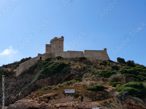 Close-up of historic Girolata Genoese fort on rocky headland Corsica