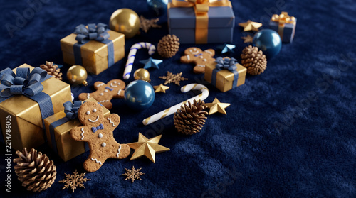Flat lay of blue and gold wrapped christmas gift boxes on dark background