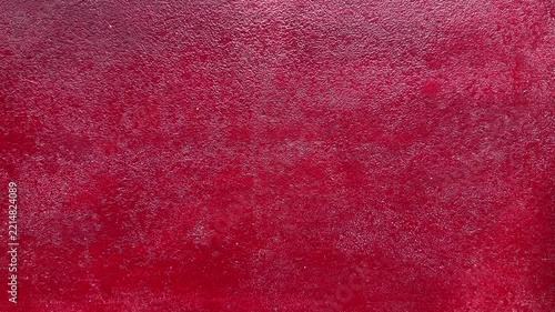Faint tree leaf shadow on red concrete surface texture, afternoon aesthetic background, 4K resolution