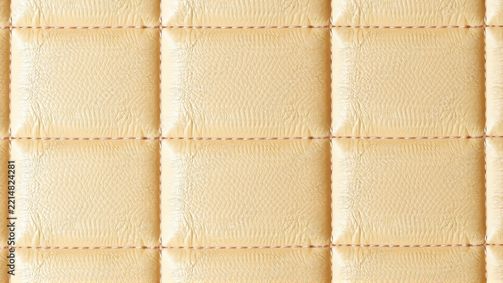 Fototapeta premium Quilted tan leather upholstery texture