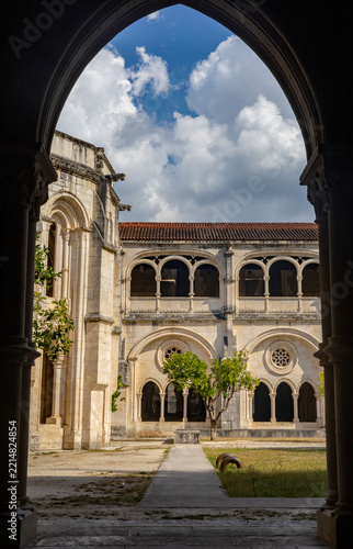 Gothic cloister of Alcobaça Monastery with arched galleries and central garden