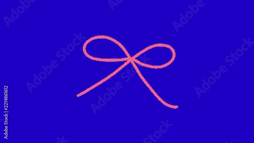 Pink ribbon bow on blue background