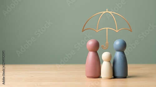 Family insurance concept represented by colorful wooden peg dolls standing under a protective golden metal umbrella symbol