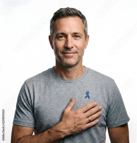 Man touching heart blue awareness pin