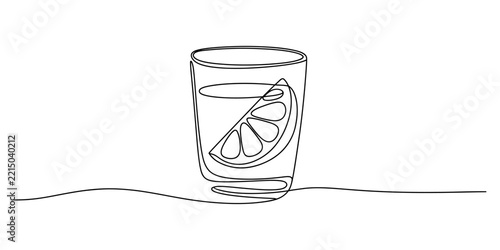 Continuous one line drawing of a glass of water with a slice of fresh lemon