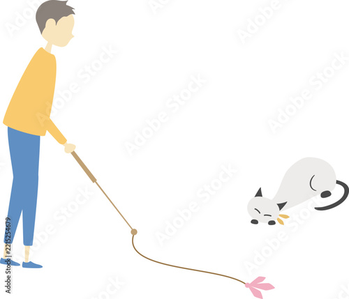 男の子とねこじゃらしで遊んでいる猫