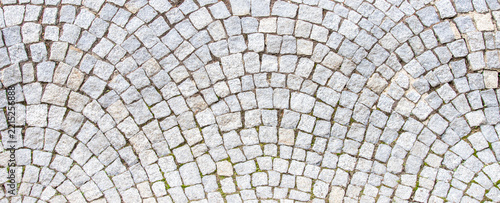 Obraz na plátně Classic fan shaped grey granite cobblestone pavement texture background