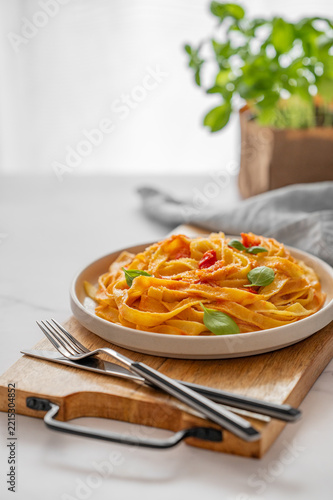 Homemade Tagliatelle Pasta with Tomato Sauce, Basil and Parmesan