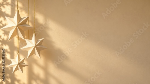 Hanging Ivory Paper Stars Casting Soft Shadows on a Beige Wall