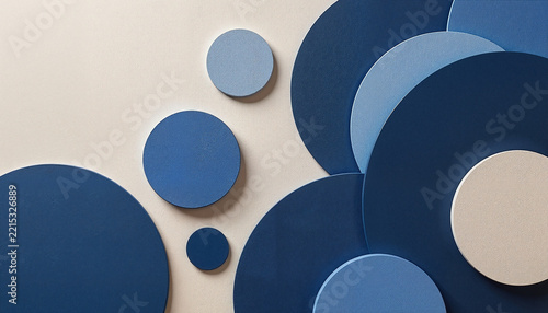 abstract arrangement of blue circles in various sizes against a neutral background suitable for modern design projects with copy space