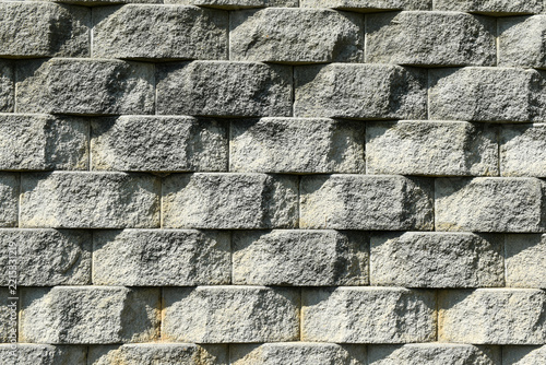  Glossy concrete and stone wall texture background with light