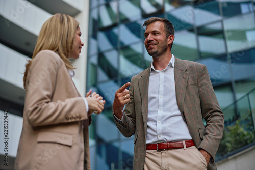Business colleagues having a dynamic outdoor discussion