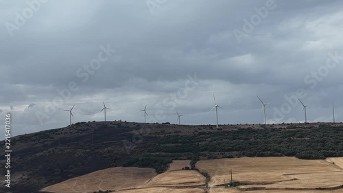 Wind renewable energy. Windmills in the highlands. Production of electric energy.