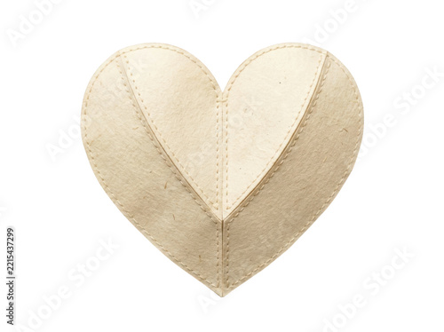 Fotografie Segmented heart shape crafted from light beige handmade paper featuring distinct