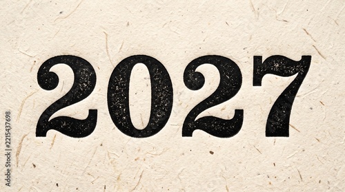 Black Letterpress 2027 Numbers on Cream Handmade Paper Texture Background for Vintage Style New Year