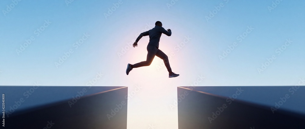Fototapeta premium Silhouette of a Man Jumping Over a Wide Gap Between Two High Structures Against a Clear Blue Sunset Sky, Representing Courage, Risk-Taking, Overcoming Obstacles, and Success in Business and Life