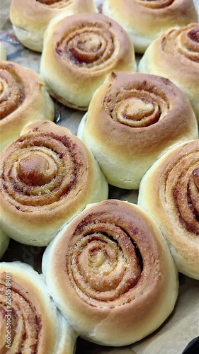 Deliciously Baked Cinnamon Rolls Fresh Out of the Oven, Showcasing Soft, Fluffy Dough with Rich Swirls of Sweet Cinnamon and Sugar, Perfect For Any Dessert Lover.