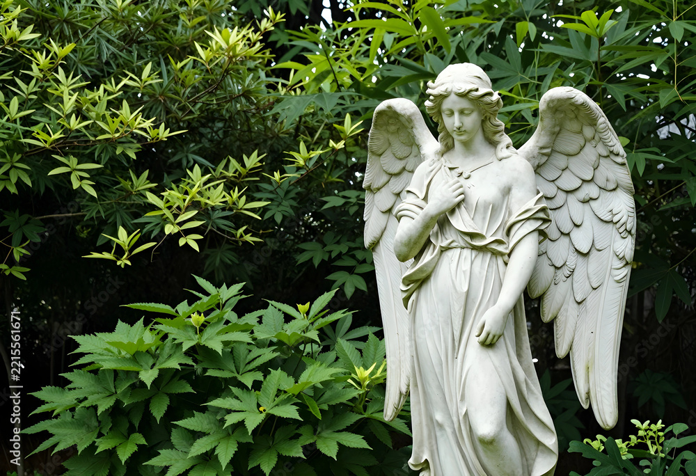 Fototapeta premium Spirituality and peace stone angel statue in a lush green garden for memorial funeral and religious reflection in a quiet outdoor nature setting