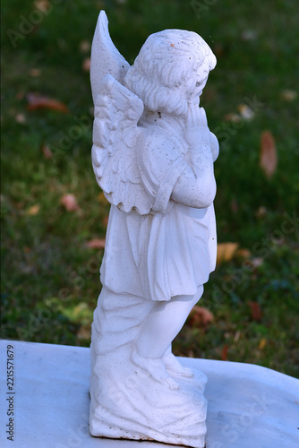 sweet angel figure on a grave