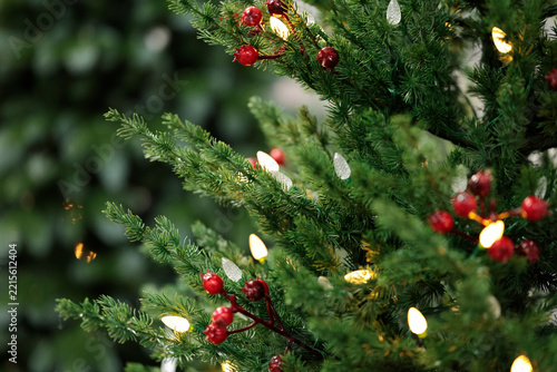 close up of decorated artificial evergreen tree