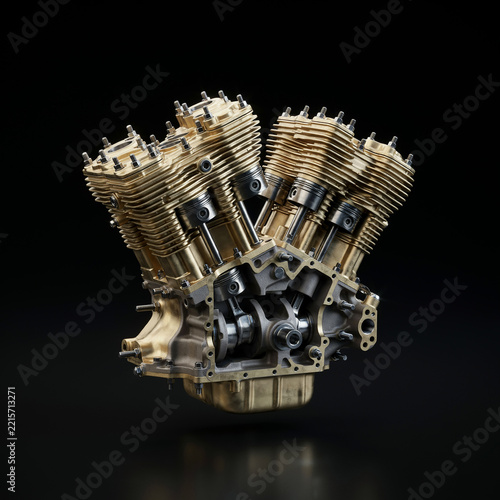 V-twin motorcycle engine isolated on black background for automotive