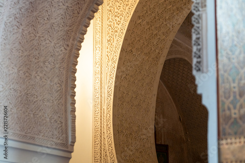 detail of the richly decorated arches
in the Ismail Mausoleum in Meknes on a spring day