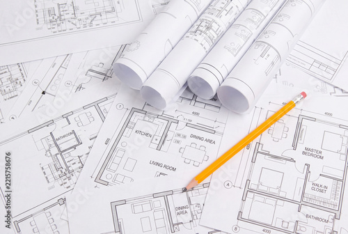 Paper architectural drawings and blueprints