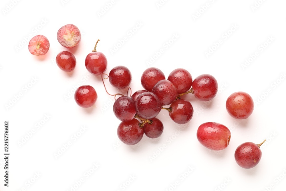 Fototapeta premium Fresh ripe grapes on white background, flat lay