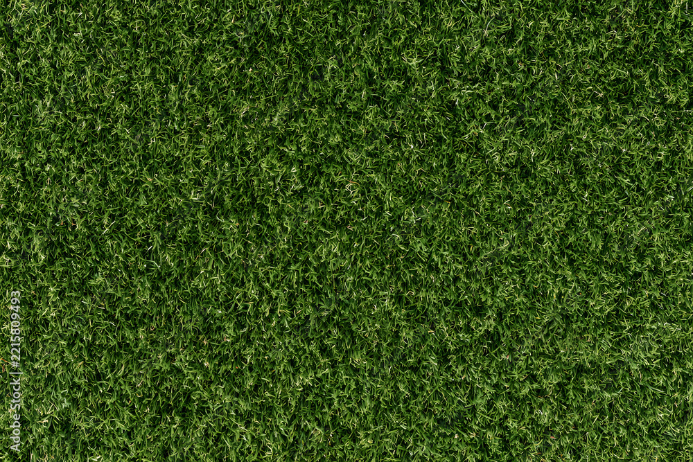 Fototapeta premium A top-down aerial photo texture of lush green sports field grass, suitable for a golf course, soccer field, football pitch, or rugby turf.