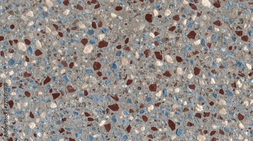 Top view of polished terrazzo surface with multicolored stone chips in cement binder