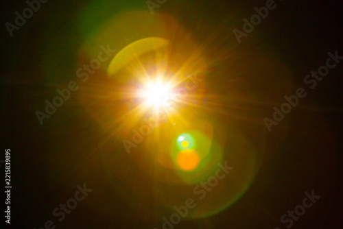 Sun flare on the black background