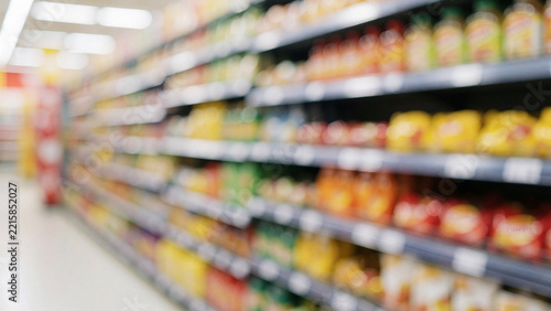 Blurred supermarket aisle background with colorful shelves