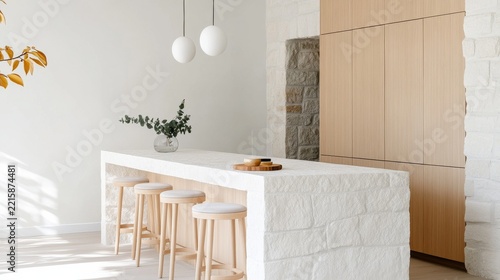 Elegant Kitchen Island Bar Featuring White stone island bar pale oak cabinets round stools soft Sc