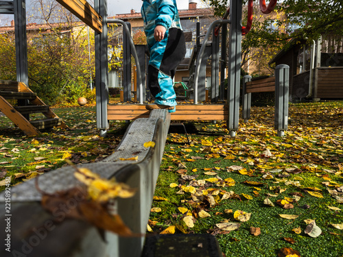 Child Developing Balance and Body Control at Playground