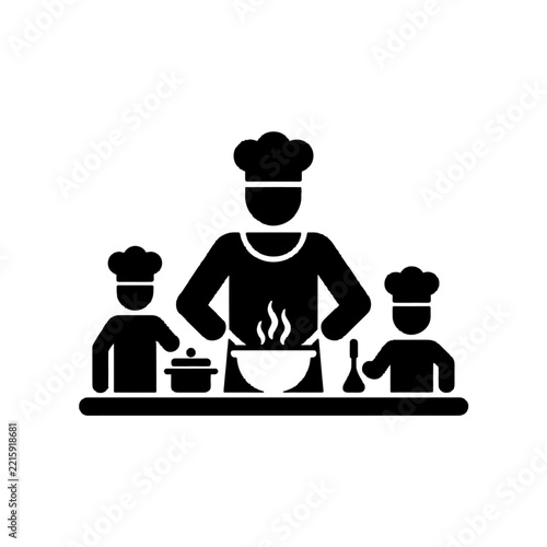 Chef Cooking with Two Assistants in Kitchen.