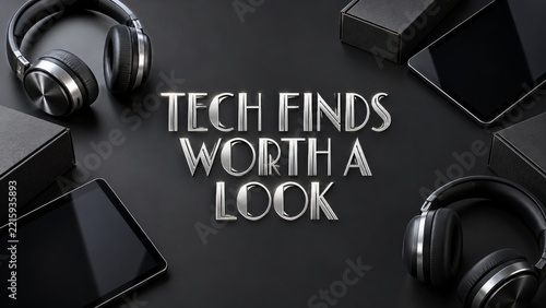 Silver Tech Finds Lettering with Black Tablets Headphones and Boxes