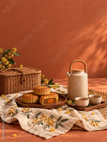 Mooncake Picnic with Woven Basket and Tall Ceramic Tea Pot on Terracotta