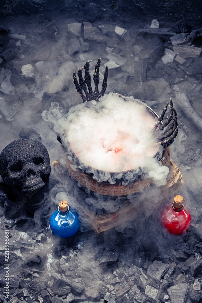 Fototapeta premium Mysterious alchemy scene with skull and potion.