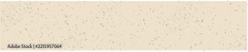 Recycled paper texture with scattered brown and black fibers and speckles on a light beige background