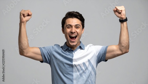 Young man celebrating football victory with enthusiastic gesture