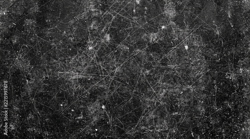 Texture of old surface on black background with white scratches