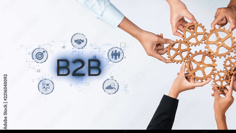 Obraz premium Diverse hands gather gears, symbolizing collaboration in business. The image highlights B2B opportunities, reflecting innovation and teamwork in a global market. Raster