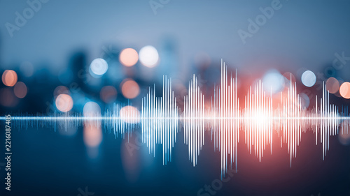 A digital audio waveform displayed across a blurred background represents voice recording sound analysis and communication technology.
