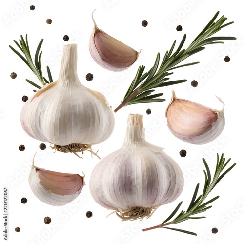 Garlic bulbs cloves rosemary peppercorns isolated white