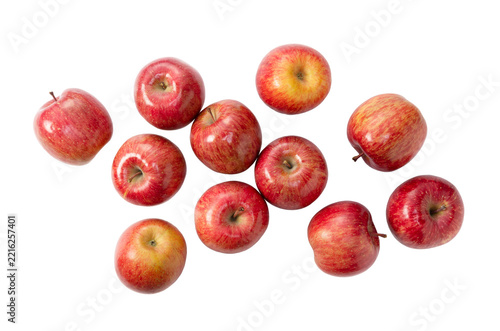Red apples scattered on transparent background, top view