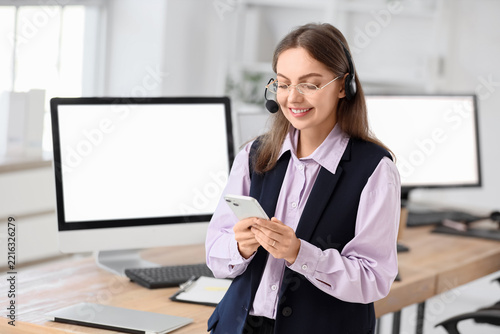 Customer support and remote communication, smiling female call center agent u...